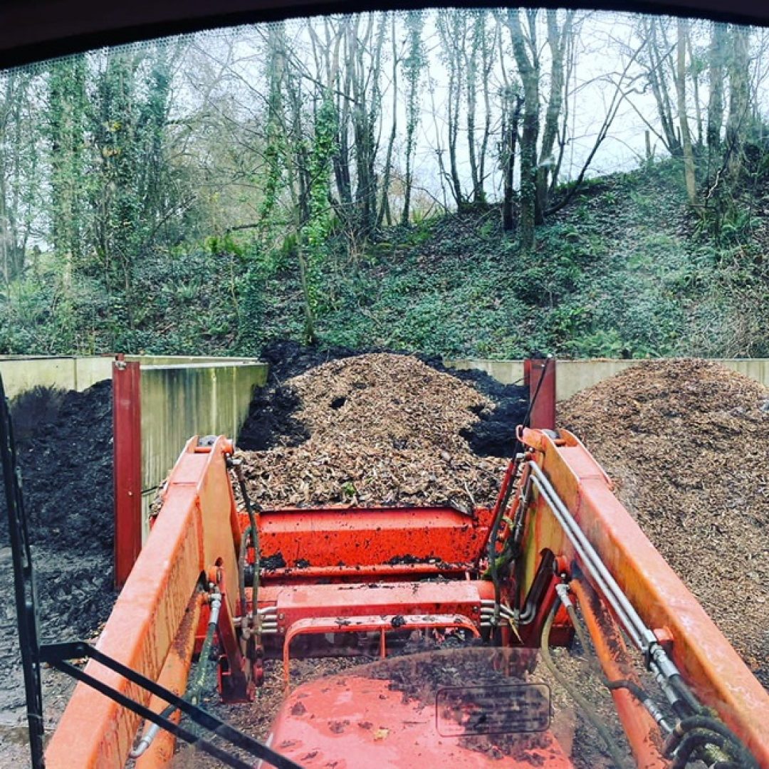 Composting at hestercombe claire greenslade digger in compost bays dec 2020