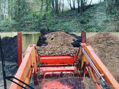 Composting at hestercombe claire greenslade digger in compost bays dec 2020