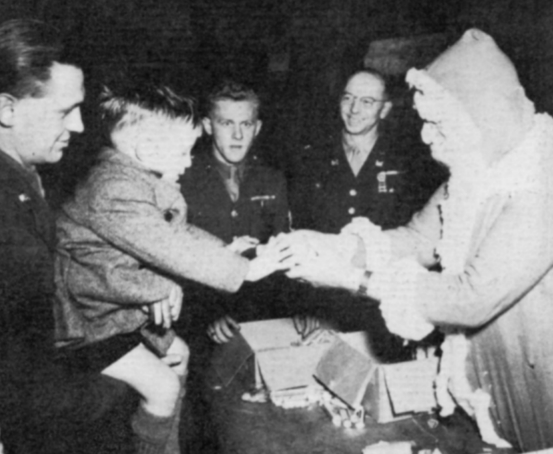 Santa giving out presents Kids Christmas Party Hestercombe Reading Room 1943